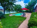 Pond, Golf, Pool lot home nestled on an oversized lot with a for sale in North Richland Hills Texas Tarrant County County on GolfHomes.com