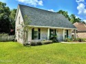 Fantastic home with lots of space located across the street fro for sale in Diamondhead Mississippi Hancock County County on GolfHomes.com