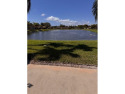 EXPERIENCE LAKEFRONT VIEWS AT THEIR BEST IN THIS impeccable for sale in Boynton Beach Florida Palm Beach County County on GolfHomes.com