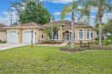 Welcome to this stunning, elegant custom home, with captivating for sale in Palm Coast Florida Flagler County County on GolfHomes.com