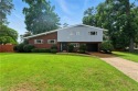 This stunning 4-bedroom, 3-bath home blends mid-century charm for sale in Newport News Virginia Newport News County County on GolfHomes.com
