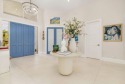 Nestled within a prestigious, gated community, this model for sale in West Palm Beach Florida Palm Beach County County on GolfHomes.com