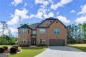 Welcome to 404 Prague Way, an exquisite residence nestled in the for sale in Hampton Georgia Henry County County on GolfHomes.com