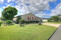 Fruit Trees, Sunshine & Freedom-it's all here on a fenced lot for sale in Micco Florida Brevard County County on GolfHomes.com