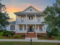 With timeless Southern charm and a welcoming double-porch design for sale in Tallahassee Florida Leon County County on GolfHomes.com