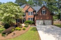 Welcome to this stunning home located in the highly desirable for sale in Woodstock Georgia Cherokee County County on GolfHomes.com