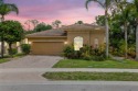 Elegant 4BR/3BA estate home in Osprey Isles, surrounded by for sale in Palm Beach Gardens Florida Palm Beach County County on GolfHomes.com