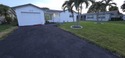 OWNER FINANCING Renovated home in 2025. 60K down pmt. 6.5% int for sale in Lake Worth Florida Palm Beach County County on GolfHomes.com