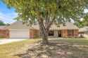 Welcome to this beautifully updated 5-bedroom, 3-bath home with for sale in Yukon Oklahoma Canadian County County on GolfHomes.com