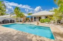 Lowest priced home in the highly sought-after Bear Island for sale in West Palm Beach Florida Palm Beach County County on GolfHomes.com