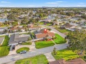 This spacious 4-bedroom, 3-bath POOL home is located in the for sale in St. Petersburg Florida Pinellas County County on GolfHomes.com