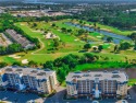 Enjoy NATURE, LIGHT AND PRIVACY in this prime location high for sale in Largo Florida Pinellas County County on GolfHomes.com