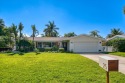 Privacy abounds in this Paradise Island waterfront home.  This for sale in Treasure Island Florida Pinellas County County on GolfHomes.com