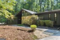 Welcome to this beautiful mid-century ranch-style house located for sale in Johns Creek Georgia Fulton County County on GolfHomes.com