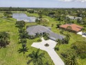 Enjoy the BEST WATER VIEW in Bay Hill Estates from this for sale in West Palm Beach Florida Palm Beach County County on GolfHomes.com