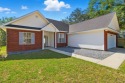 Welcome to this beautifully maintained 3-bedroom, 2-bathroom for sale in Crawfordville Florida Wakulla County County on GolfHomes.com