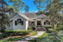 Welcome to this beautifully maintained 4-bedroom, 4-bathroom for sale in Hilton Head Island South Carolina Beaufort County County on GolfHomes.com