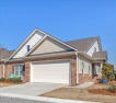 Experience coastal living in this meticulously maintained for sale in Southport North Carolina Brunswick County County on GolfHomes.com