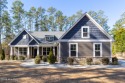 Nestled along the par 3, 8th hole of Foxfire Resort and Golf's for sale in Jackson Springs North Carolina Moore County County on GolfHomes.com