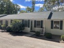 Enjoy easy *lock-and-go* living in this beautifully updated for sale in Daniels West Virginia Raleigh County County on GolfHomes.com