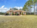 Beautiful all-brick home in a desirable golf course community for sale in Freeport Florida Walton County County on GolfHomes.com