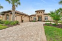This exquisite Custom home set on the Grand Haven golf course for sale in Palm Coast Florida Flagler County County on GolfHomes.com