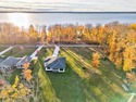 Experience refined modern living in this stunning 2025 for sale in Manistique Michigan Schoolcraft County County on GolfHomes.com