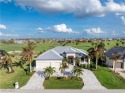 Experience luxury and sophistication in this Custom Built for sale in Punta Gorda Florida Charlotte County County on GolfHomes.com