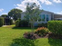 OWN YOUR LAND in this 55+ active community. This updated and for sale in Hobe Sound Florida Martin County County on GolfHomes.com