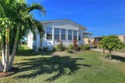 Built in 2021, this beautiful and spacious 2-bedroom, 2-bath for sale in Barefoot Bay Florida Brevard County County on GolfHomes.com