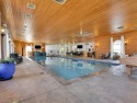 RARE FIND WITH AN INDOOR POOL! Beautiful 3+ acre lot, featuring for sale in Granbury Texas Hood County County on GolfHomes.com