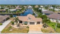 PGI's highly sought SEC 12 near the rim canal! This home for sale in Punta Gorda Florida Charlotte County County on GolfHomes.com