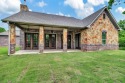 Peace and tranquility are found at this stunning home on 5+ for sale in Bowie Texas Montague County County on GolfHomes.com