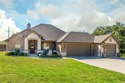 Welcome to this beautifully maintained 3-bedroom, 2-bath home on for sale in Runaway Bay Texas Wise County County on GolfHomes.com