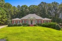 Welcome to this custom-built 4-bedroom, 3 1/2 bath all-brick for sale in Mcdonough Georgia Henry County County on GolfHomes.com