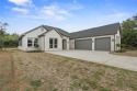 Welcome to your dream retreat in one of Lake Whitney's most for sale in Whitney Texas Hill County County on GolfHomes.com