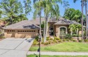 Beautiful pool home located in the gated community of Aberdeen for sale in Oldsmar Florida Pinellas County County on GolfHomes.com
