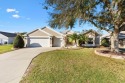 A RARE FIND HERE! POOL HOME ON GOLF COURSE.  Stunning Designer for sale in The Villages Florida Sumter County County on GolfHomes.com