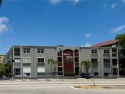 Lowest fees in town! $222 monthly.  Corner Condo in the Heart of for sale in Pompano Beach Florida Broward County County on GolfHomes.com