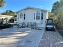 SILVER LAKES R/V and GOLF RESORT:   You have arrived at one of for sale in Naples Florida Collier County County on GolfHomes.com