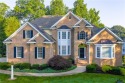 Set on a private golf course view lot, this timeless brick for sale in Williamsburg Virginia James City County County on GolfHomes.com