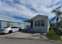 TWO BED, ONE BATH HOME IN ACTIVE 55+ COMMUNITY! This furnished for sale in Bradenton Florida Manatee County County on GolfHomes.com
