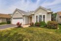 POPULAR CATIGNY MODEL w/sunroom! Large living room/dining room for sale in Huntley Illinois Mchenry County County on GolfHomes.com