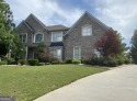 Welcome to this stunning 4-sided brick home perfectly situated for sale in Locust Grove Georgia Henry County County on GolfHomes.com