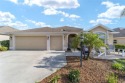 BOND PAID and NEW ROOF on this LOVELY BEGONIA designer home with for sale in The Villages Florida Marion County County on GolfHomes.com