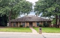 Step into this beautifully updated 4-bedroom, 3-bath home for sale in Arlington Texas Tarrant County County on GolfHomes.com