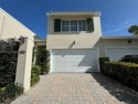 Absolutely enchanting 4-bed/4-bath courtyard townhome with a for sale in Boca Raton Florida Palm Beach County County on GolfHomes.com