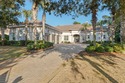 An entertainer's dream set along the 16th fairway of the Raven for sale in Destin Florida Walton County County on GolfHomes.com