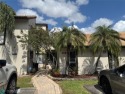 Amazing villa with 2 master suites. Walk in closets in both for sale in Plantation Florida Broward County County on GolfHomes.com