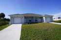 This duplex is head to toe luxury finishes from quartz counter for sale in Port Charlotte Florida Charlotte County County on GolfHomes.com